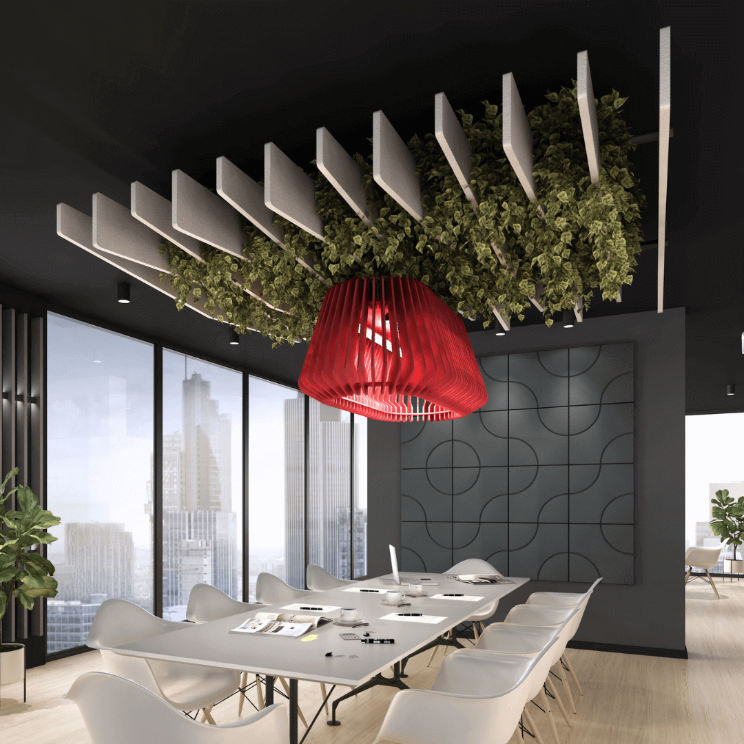 Modern office meeting room featuring unique red pendant light and greenery above the conference table.