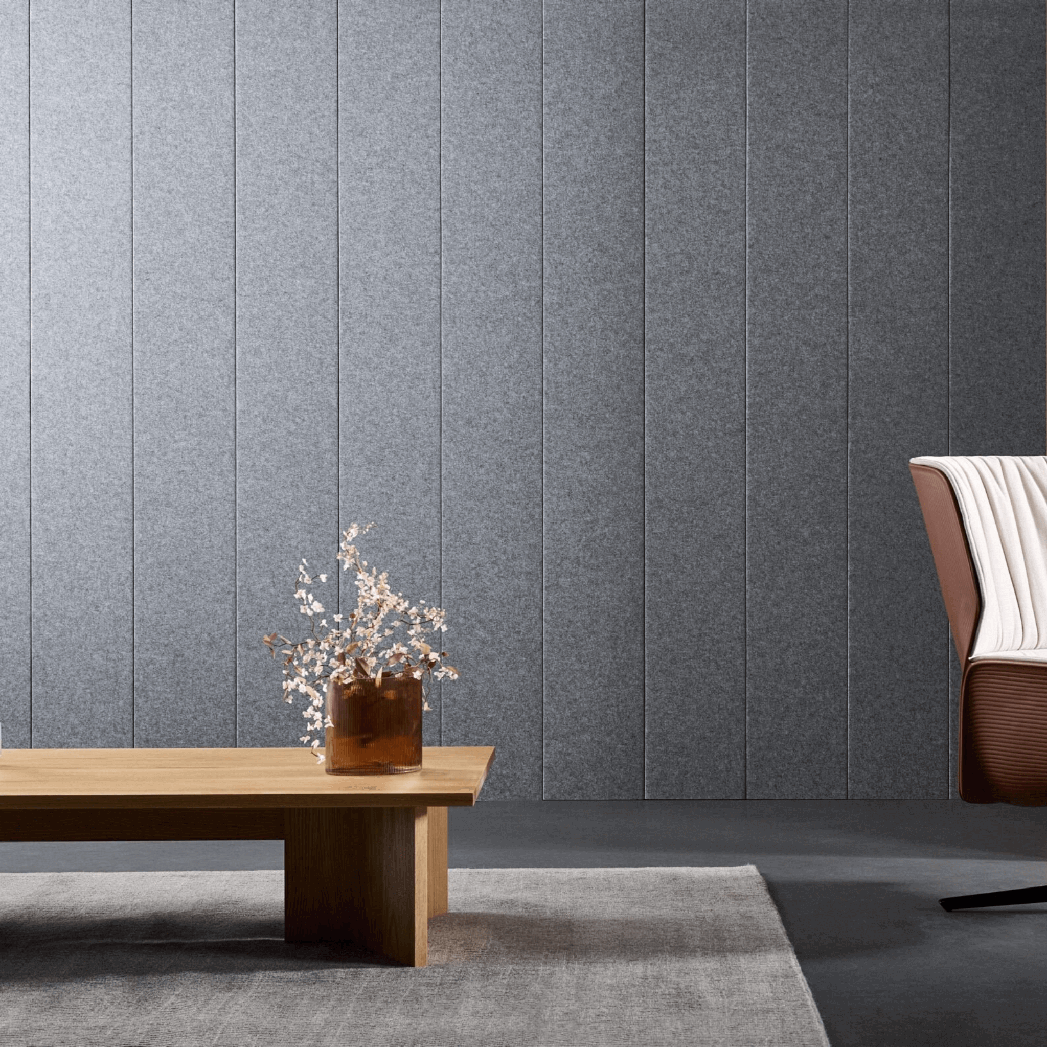 Stylish acoustic panels in grey, enhancing sound quality in a modern interior with a wooden table and decorative vase.