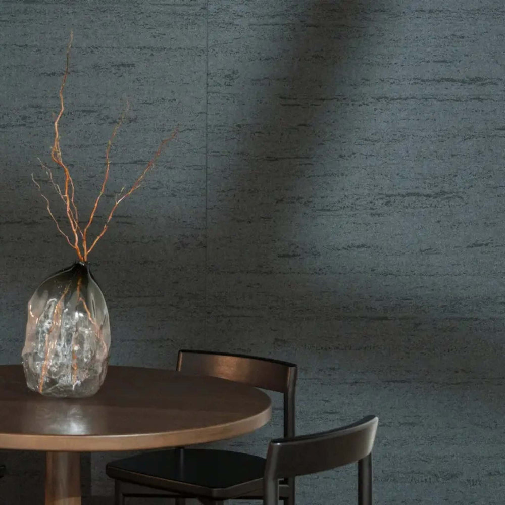 Modern dining space featuring Autex Mirage™ textured panel wall with a sleek table and decorative vase.