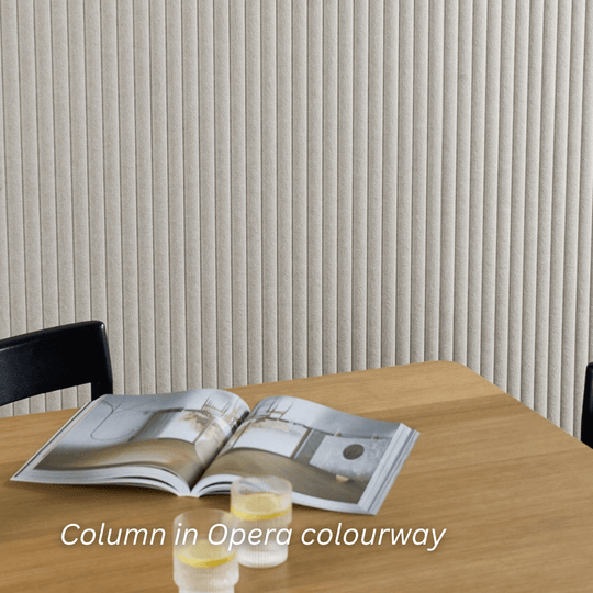 Verve in Opera colourway featuring vertical textures, complemented by a wooden table and decorative candles.