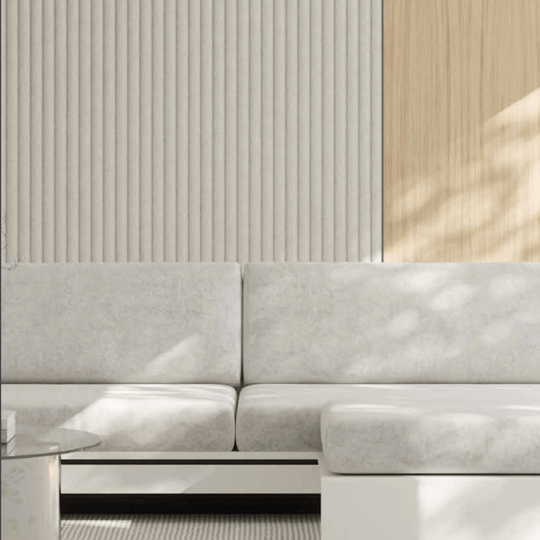 Modern living room featuring Acoufelt QuietForm™ acoustic tiles with a sleek, minimalist sofa and wooden wall accents.