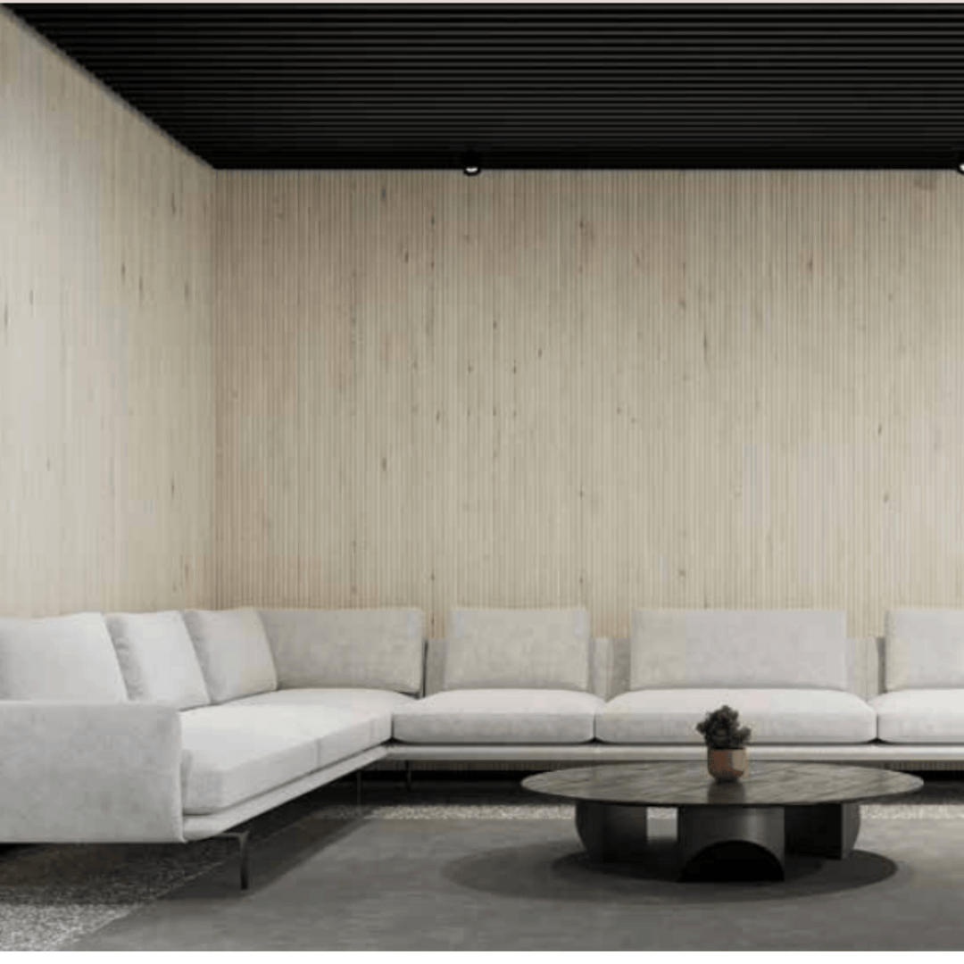 Acoufelt QuietForm™ 3D Debossed Acoustic Tiles "Flute" featured in a modern living room with a sleek couch and coffee table.