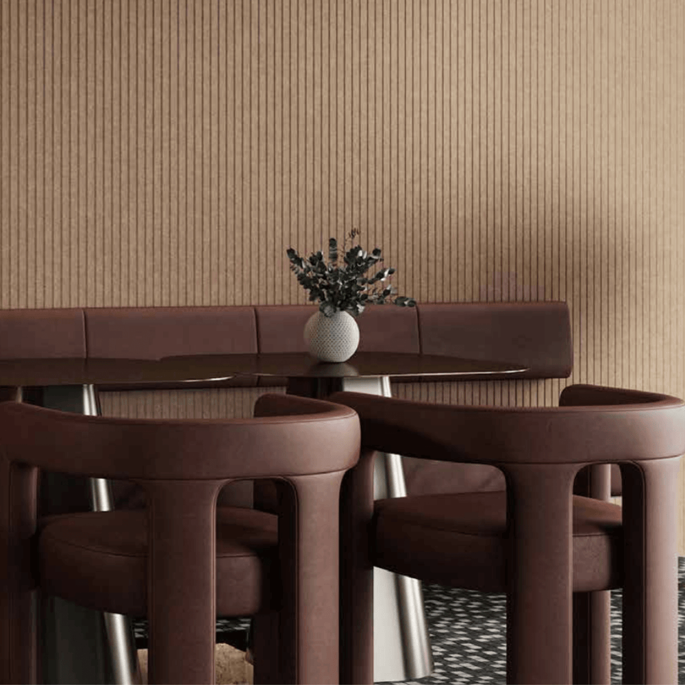 Acoufelt QuietForm™ 3D Debossed Acoustic Tiles "Pole" enhancing a modern interior with stylish brown seating and decorative vase.