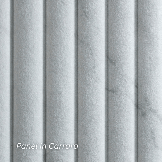 Close-up of Verve Contoured Panel in Carrara, showcasing textured design and elegant light interaction.