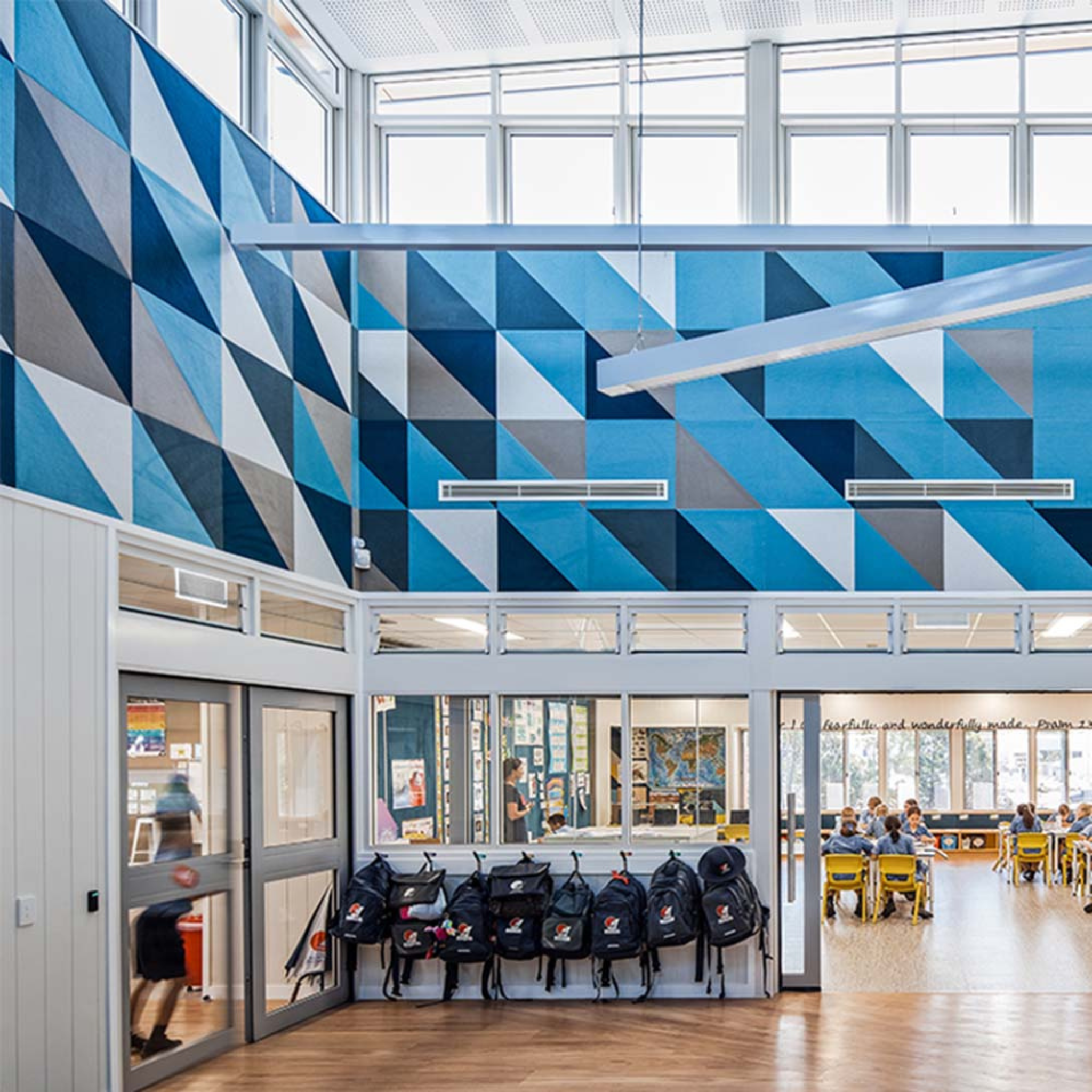 Stylish acoustic panels in a school interior, enhancing soundproofing for a focused learning environment.