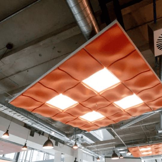 Autex 3D Acoustic Ceiling Tiles in orange, enhancing sound absorption and modern design in a contemporary space.