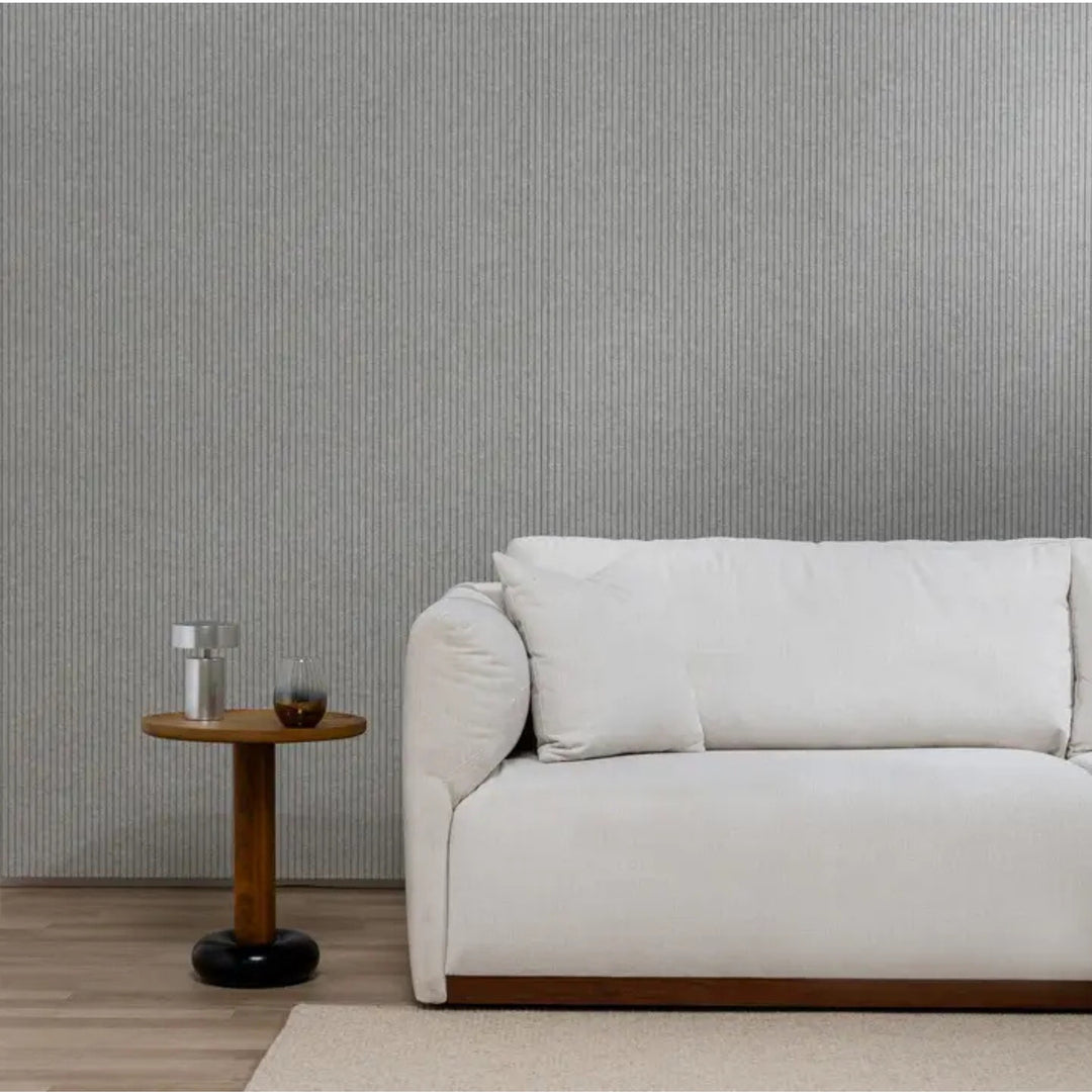 Autex Mirage™ textured panel in a contemporary living room setting with white sofa and side table.