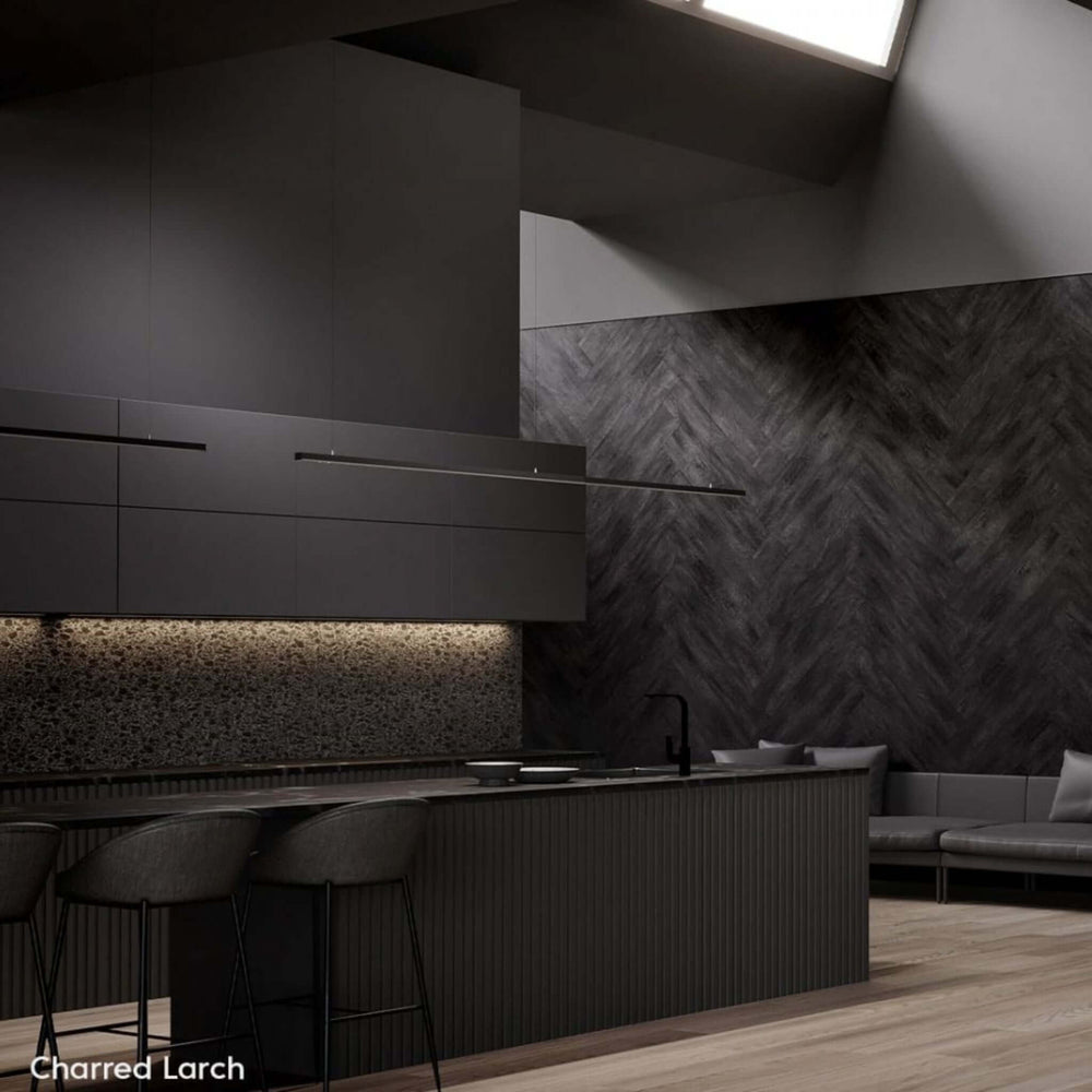 Modern kitchen featuring Charred Larch WoodBeQuiet™ acoustic wall planks, enhancing aesthetics and acoustics.