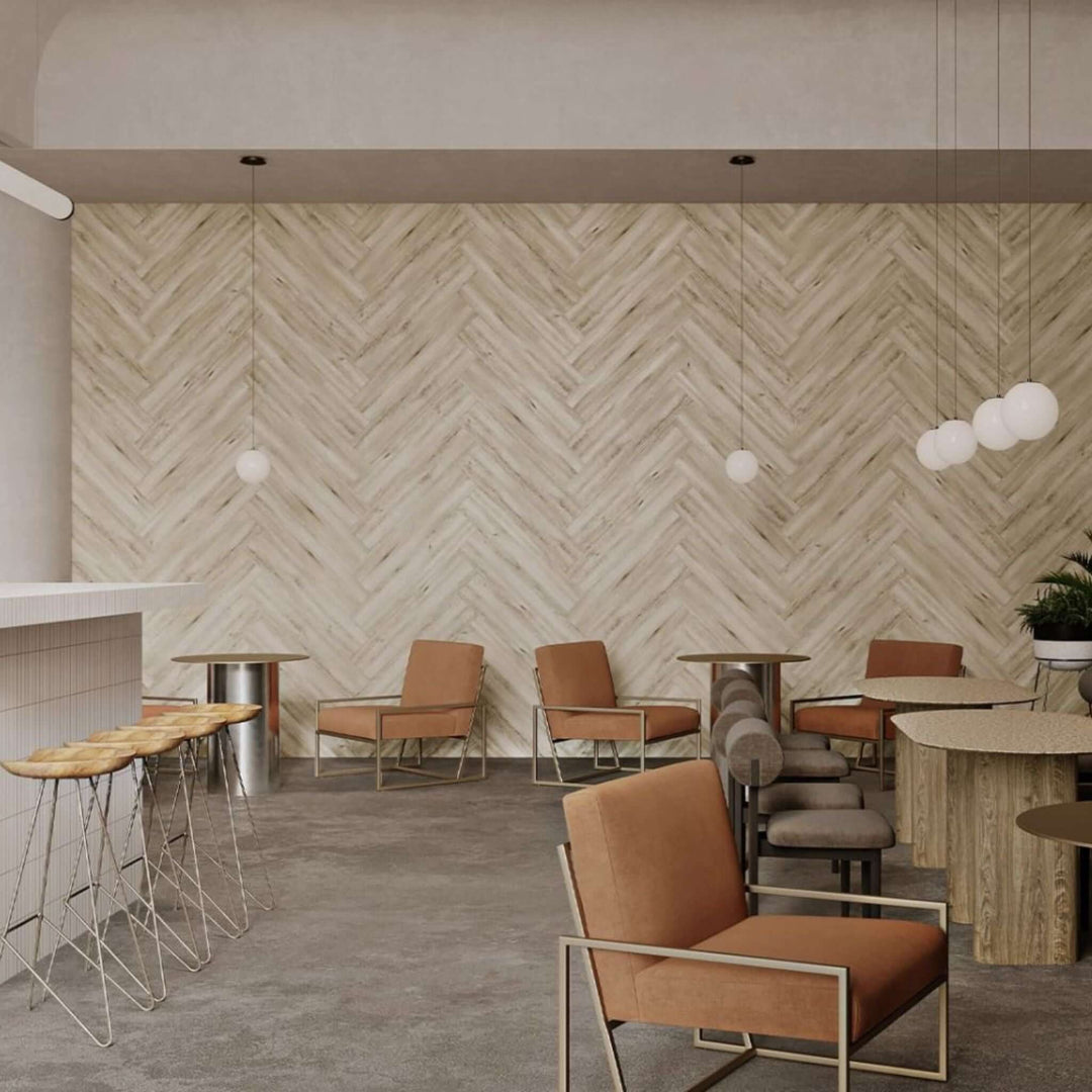 Modern interior featuring Acoufelt WoodBeQuiet™ acoustic wall planks in herringbone pattern, enhancing acoustics and aesthetics.