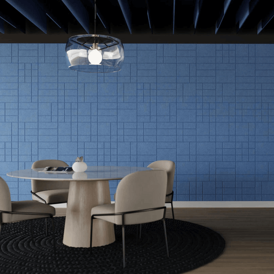 Modern dining area featuring Acoufelt Fracture Acoustic Tiles in blue, enhancing sound absorption and interior design.