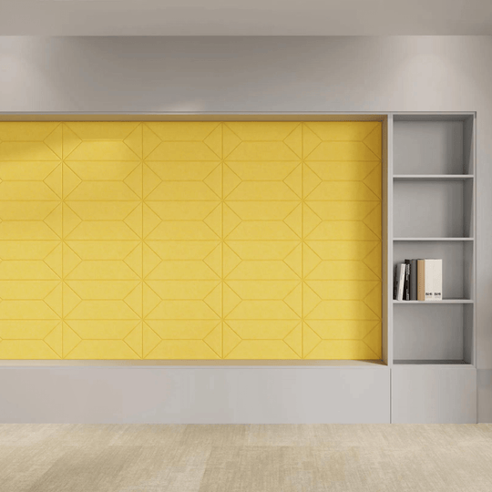 Acoufelt Fracture Acoustic Tiles in yellow on a modern wall, enhancing interior design and sound absorption.