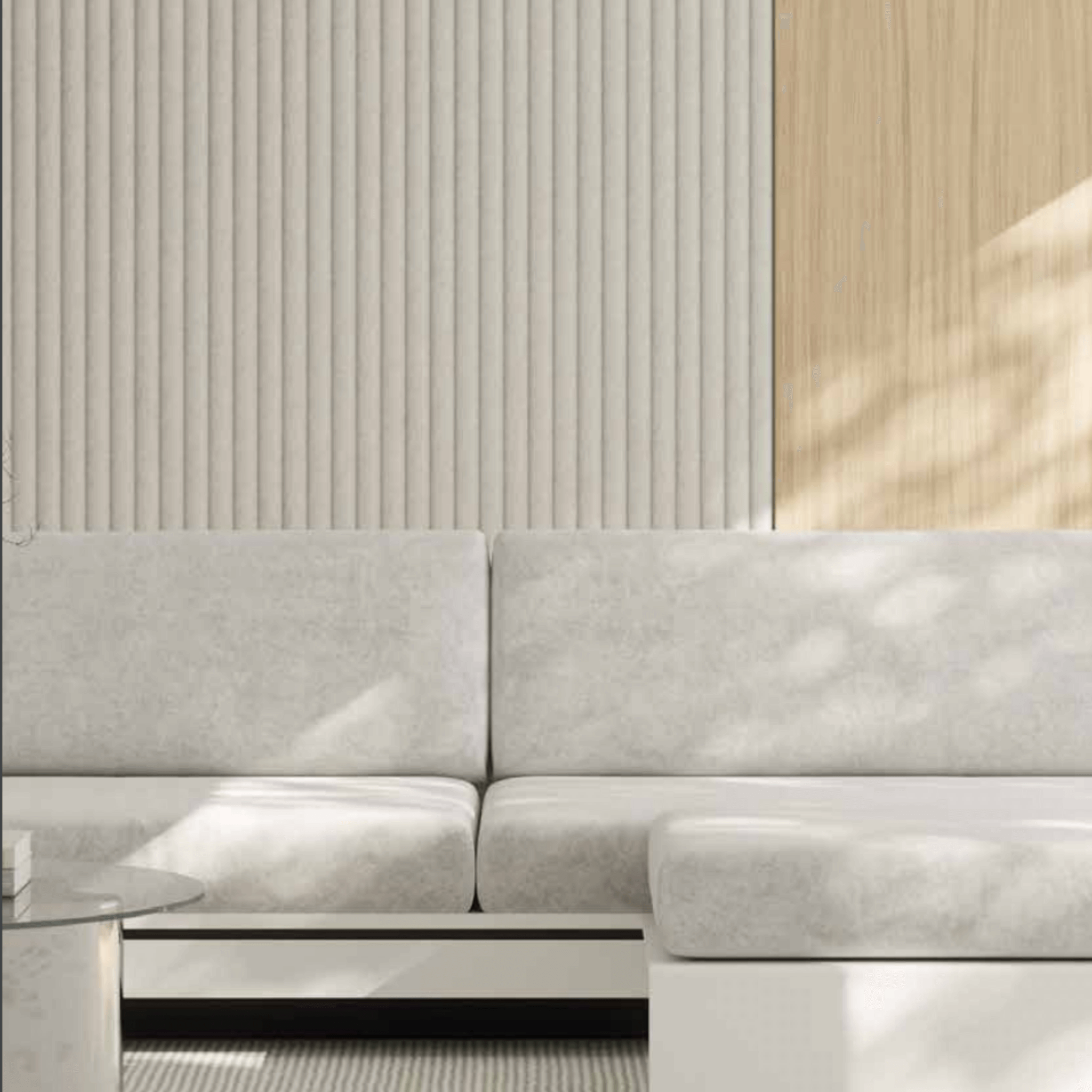 Modern living room featuring Acoufelt QuietForm™ acoustic tiles with a sleek, minimalist sofa and wooden wall accents.
