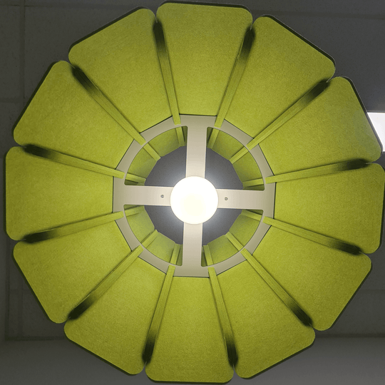 Acoustek Petal Acoustic Light Shade in vibrant green, showcasing its unique petal design and central light fixture.