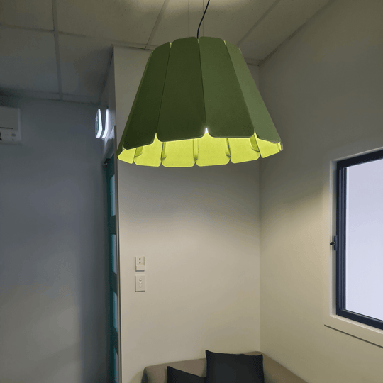 Acoustek Petal Acoustic Light Shade in green, enhancing interior design and reducing noise in a modern room.