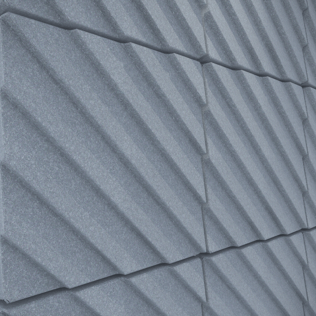 Textured acoustic wall tiles from the Acoustek Newport Collection in blue, designed for noise reduction and modern aesthetics.