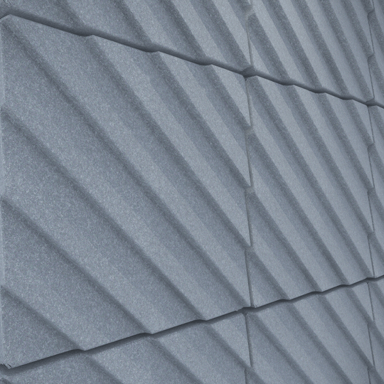 Textured acoustic wall tiles from the Acoustek Newport Collection in blue, designed for noise reduction and modern aesthetics.