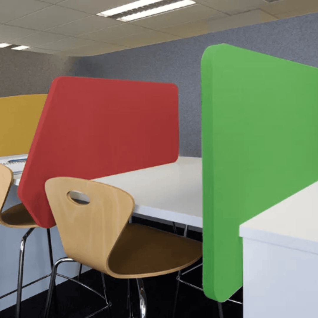 Colorful Autex Cove Desk Dividers in an open office, enhancing privacy and reducing noise for focused work.