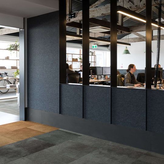 Modern office interior featuring Autex Cube™ Acoustic Panels providing stylish sound absorption.