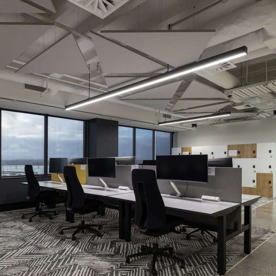 Modern office workspace featuring Autex Horizon Hanging Acoustics panels enhancing sound quality and aesthetics.