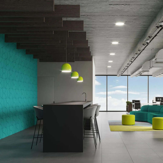 Modern office interior featuring Acoufelt Fracture Acoustic Tiles with vibrant colors and stylish furniture.