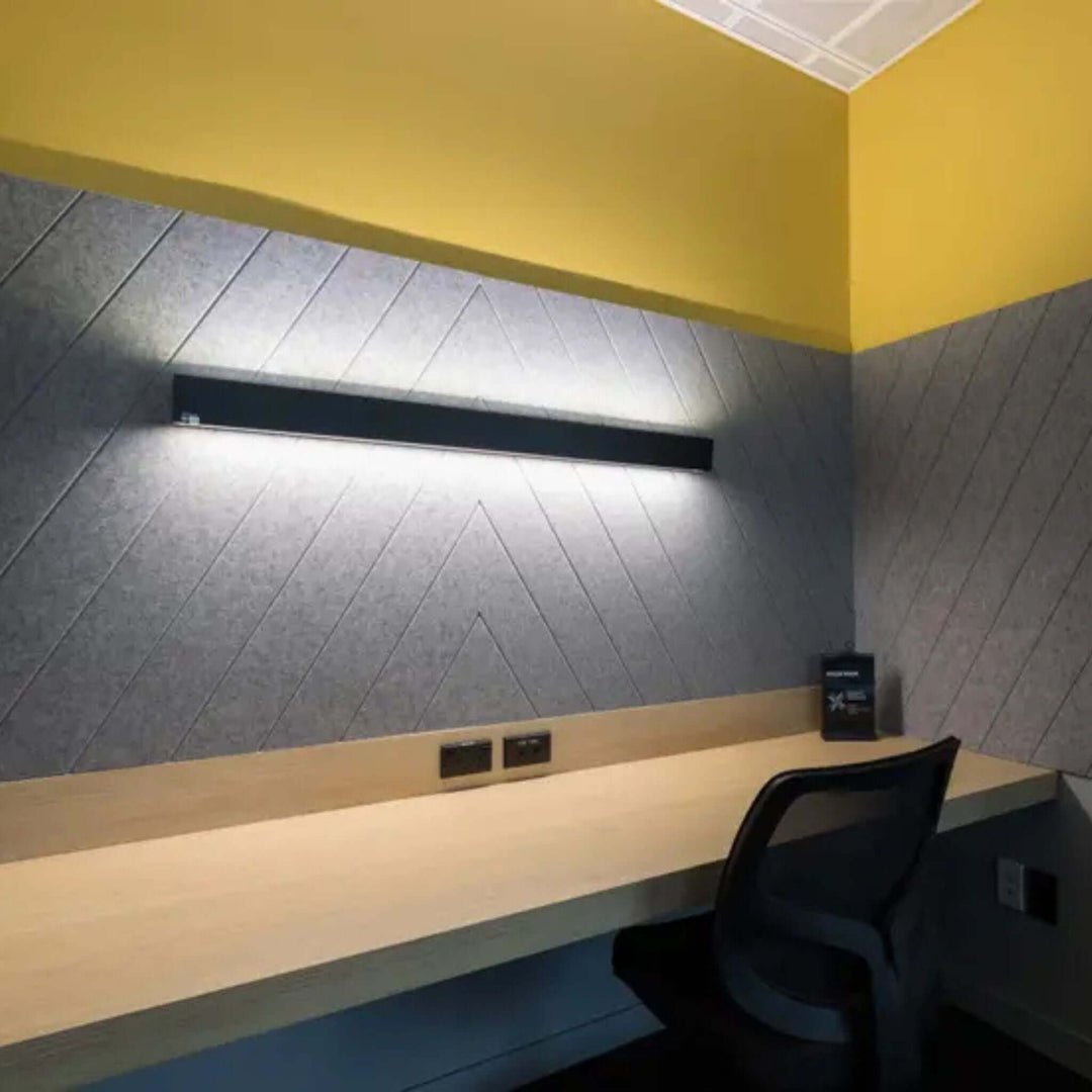 Autex Groove Acoustic Panels in a modern workspace, enhancing sound absorption and aesthetics with angular cuts.