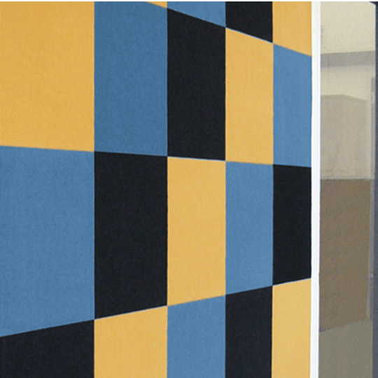 Vibrant collage of Autex Composition® Peel n Stick Acoustic Tiles in blue, yellow, and black for stylish sound dampening.