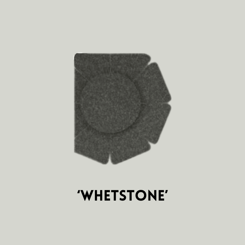 Whetstone 3D acoustic wall panel in dark gray, designed for noise reduction and aesthetic appeal.