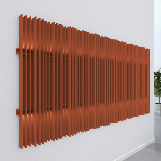 Acoustic wall blades in a striking orange finish, enhancing decor and reducing reverberate noise.