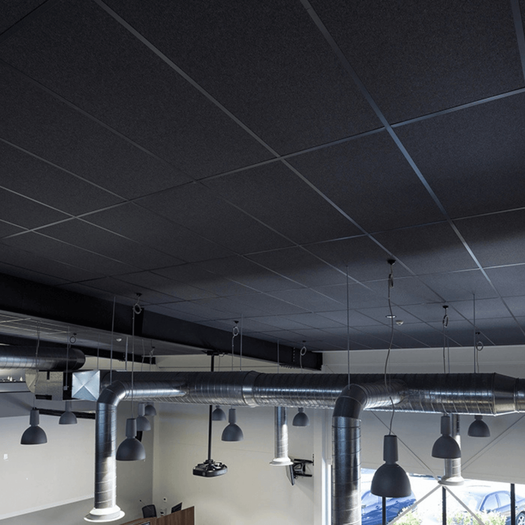 Autex Accent Ceiling Tile in a modern office setting, featuring a dark acoustic ceiling design with pendant lights.