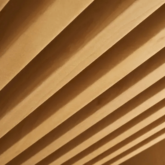 Close-up of Autex Acoustic Timber Rafts showcasing their modular, slatted design for enhanced acoustic control.