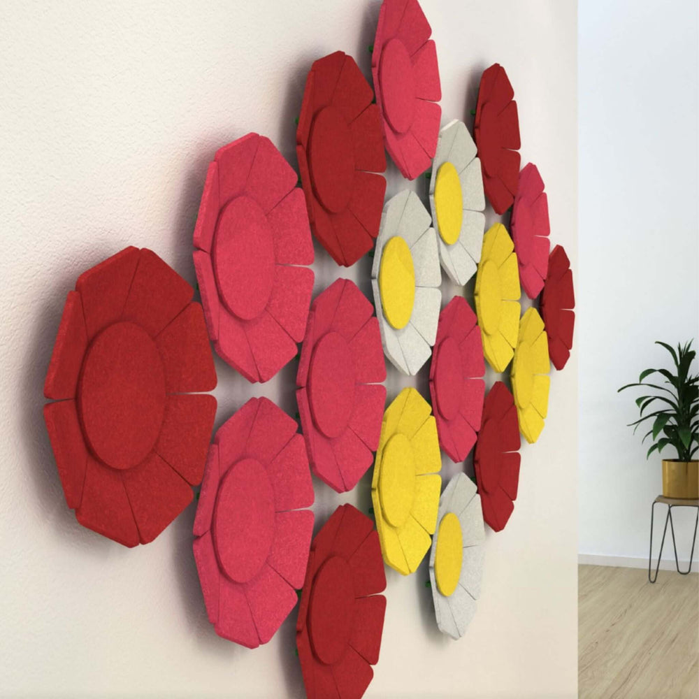 Colorful Acoustek WallFlower 3D acoustic wall panels in red, yellow, and gray, enhancing decor and reducing noise.